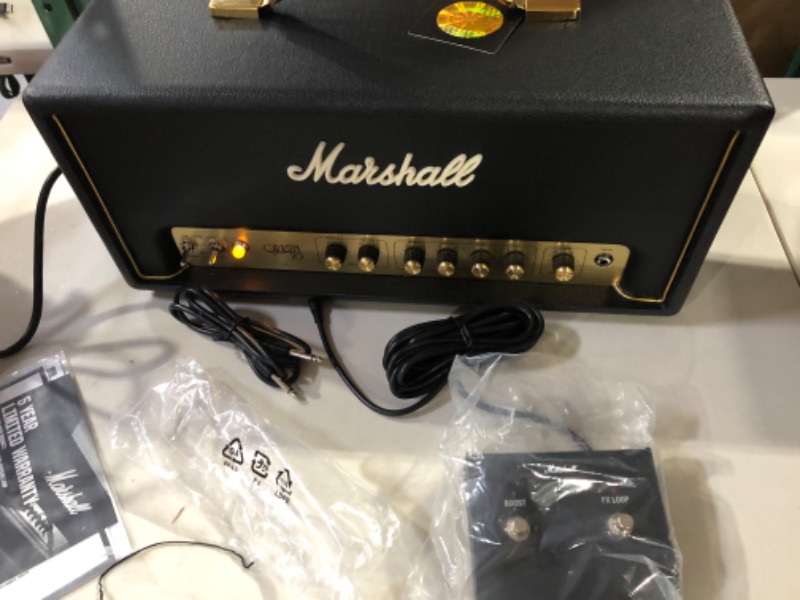 Photo 4 of Marshall ORI20H Origin 20-watt Tube Head
Packed with 3 ECC83 preamp tubes and 2 EL34 power tubes
Separate Gain and Master controls for dialing in the right amount of crunch
Presence knob and 3-band EQ for shaping your tone
Unique Tilt control blends brigh