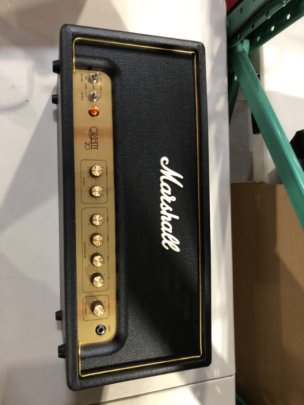 Photo 2 of Marshall ORI20H Origin 20-watt Tube Head
Packed with 3 ECC83 preamp tubes and 2 EL34 power tubes
Separate Gain and Master controls for dialing in the right amount of crunch
Presence knob and 3-band EQ for shaping your tone
Unique Tilt control blends brigh