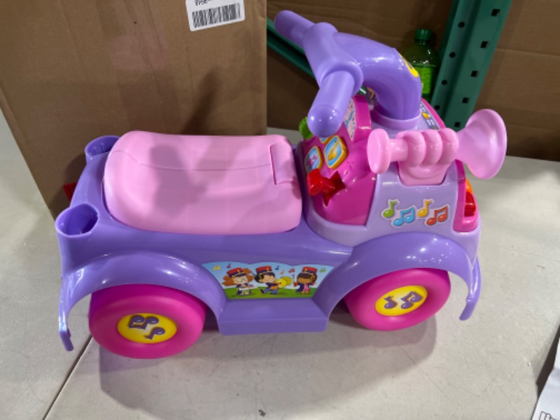 Photo 2 of Fisher Price Music Parade Purple Ride-On with 5 Different Marching Tunes! [Amazon Exclusive]