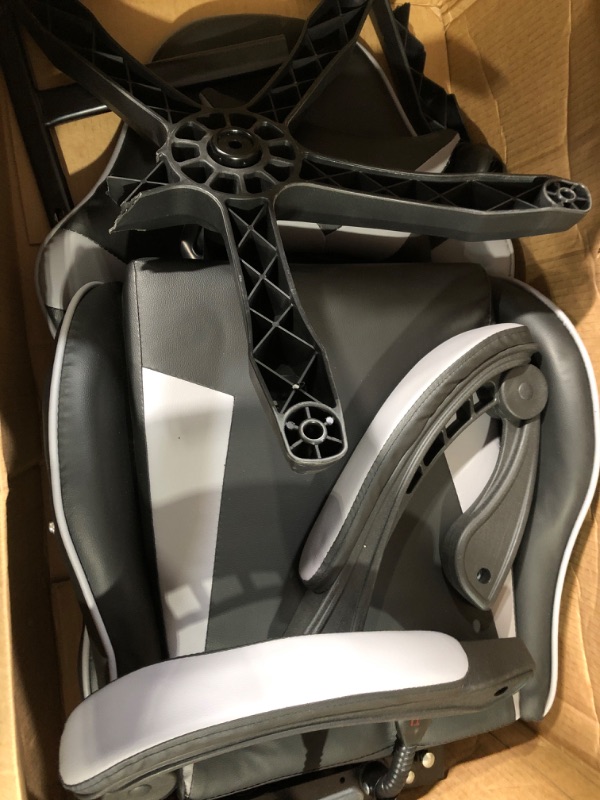 Photo 1 of Black and Grey gaming chair.