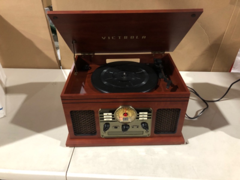 Photo 1 of Victrola Nostalgic 6-in-1 Bluetooth Record Player & Multimedia Center with Built-in Speakers - 3-Speed Turntable, CD & Cassette Player, FM Radio | Wireless Music Streaming | Mahogany Mahogany Entertainment Center