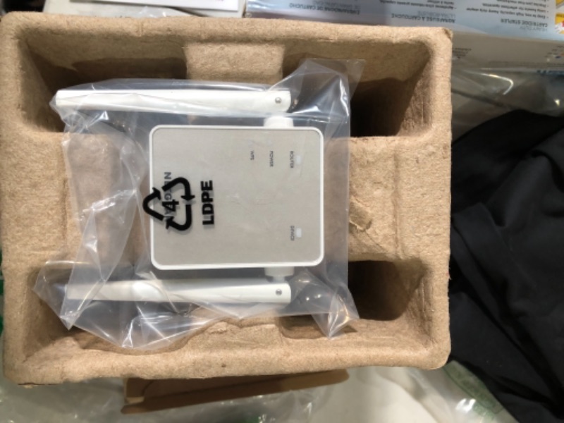 Photo 2 of NETGEAR Wi-Fi Range Extender EX6120 - Coverage Up to 1500 Sq Ft and 25 Devices with AC1200 Dual Band Wireless Signal Booster & Repeater (Up to 1200Mbps Speed), and Compact Wall Plug Design WiFi Extender AC1200