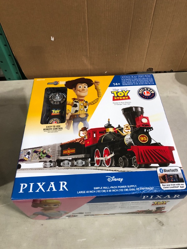 Photo 2 of Lionel Pixar's Toy Story Electric O Gauge Model Train Set w/ Remote and Bluetooth Capability