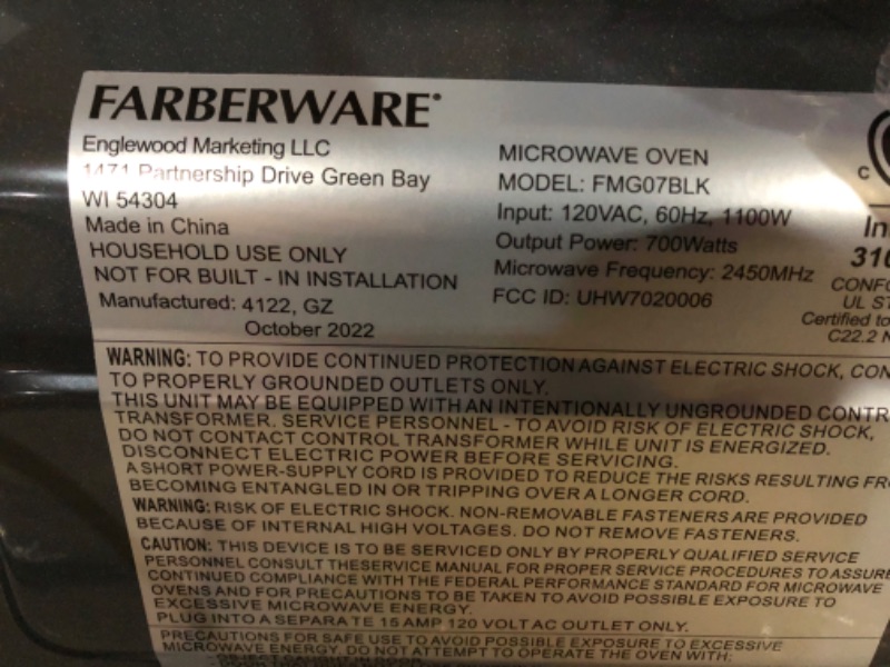 Photo 4 of Farberware Compact Countertop Microwave Oven 0.7 Cu. Ft. 700-Watt with LED Lighting, Child Lock, Easy Clean Grey Interior, Retro Black