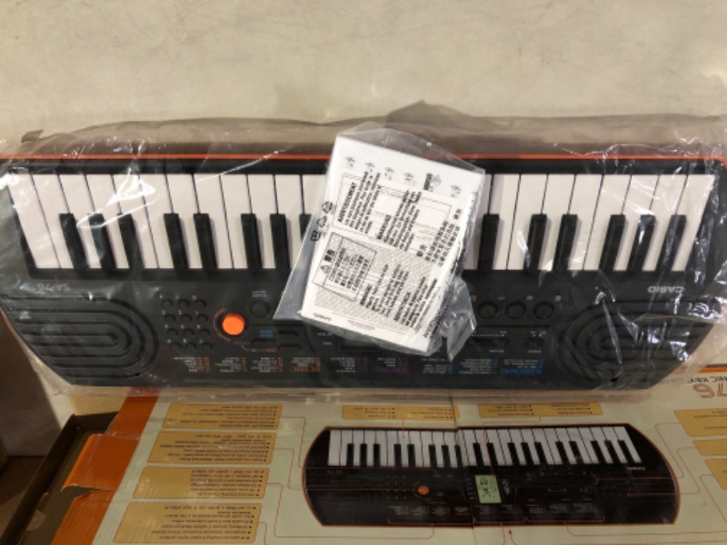 Photo 2 of Casio SA-76 44-Key Mini Personal Keyboard ORANGE SA-76 Keyboard