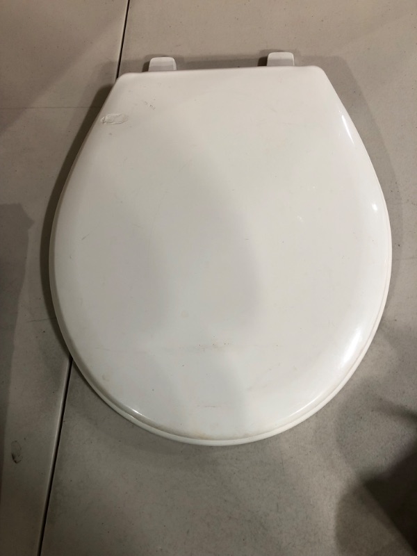 Photo 2 of Bemis Elongated Plastic Toilet Seat in Biscuit Fits Eljer Emblem with Top-Tite Hinge
