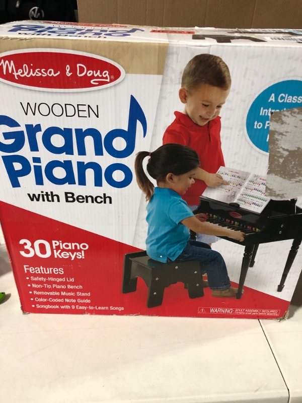 Photo 2 of Melissa & Doug Learn-To-Play Classic Grand Piano With 30 Keys, Color-Coded Songbook, and Non-Tip Bench 