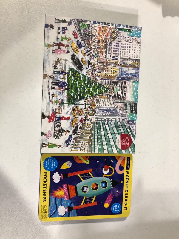 Photo 3 of Activity Bundle: Michael Storrings Snowfall on Park Avenue 1000 Piece Puzzle from Galison  and Magnet Tin Build Rocket Ships 