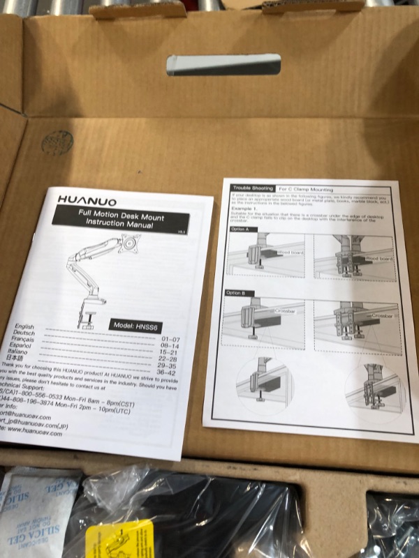 Photo 2 of HUANUO Single Monitor Mount - Gas Spring Monitor Arm Fits 13-32'' Monitor, Full Motion Swivel, Single Monitor Stand, Ultra Height Adjustable for Stand Work, Monitor Desk Stand with VESA, Max 19.8lbs
