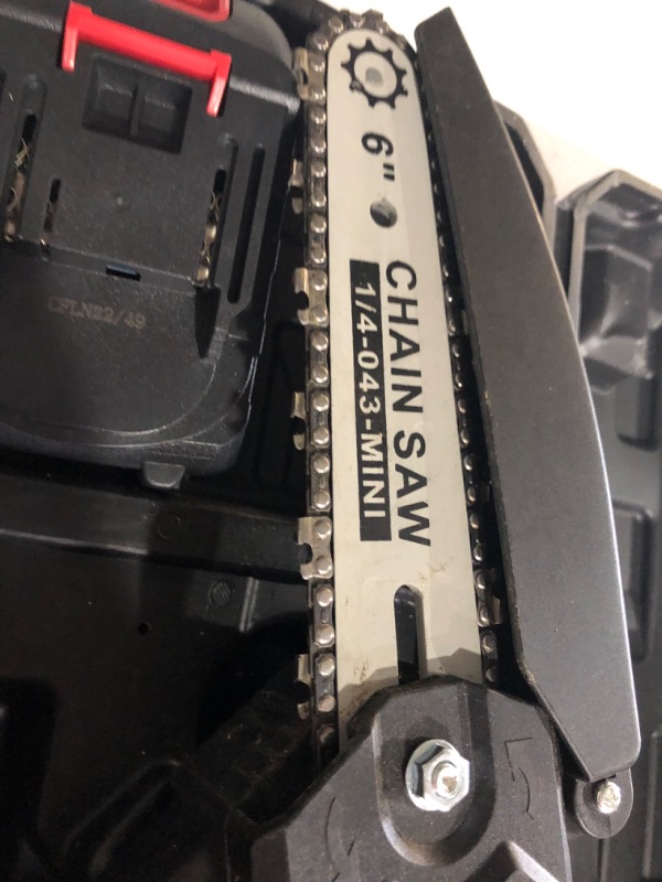 Photo 1 of **See Notes**
Mini Chainsaw 6-Inch with 2 Battery