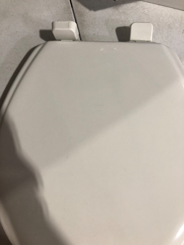 Photo 3 of * minor damage * see images *
Jamestown Never Loosens Round Closed Front Enameled Wood Toilet Seat in White with Adjustability and Slow Close