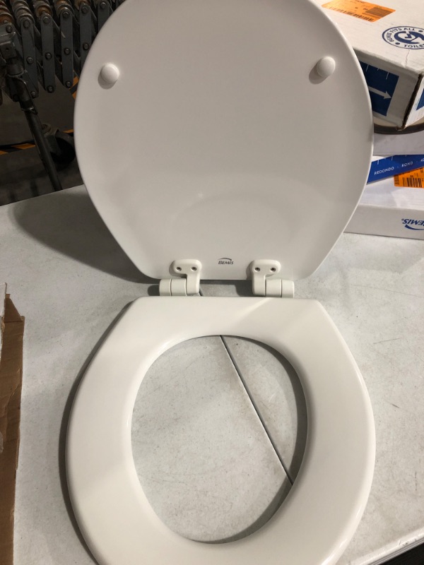 Photo 2 of * minor damage * see images *
Jamestown Never Loosens Round Closed Front Enameled Wood Toilet Seat in White with Adjustability and Slow Close