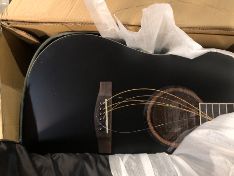 Photo 2 of **MAJOR DAMAGE**
 Donner Black Acoustic Guitar 41"