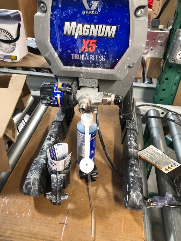 Photo 2 of **FOR PARTS ONLY**
Graco Magnum 262800 X5 Stand Airless Paint Sprayer, Blue Magnum X5 Airless Paint Sprayer