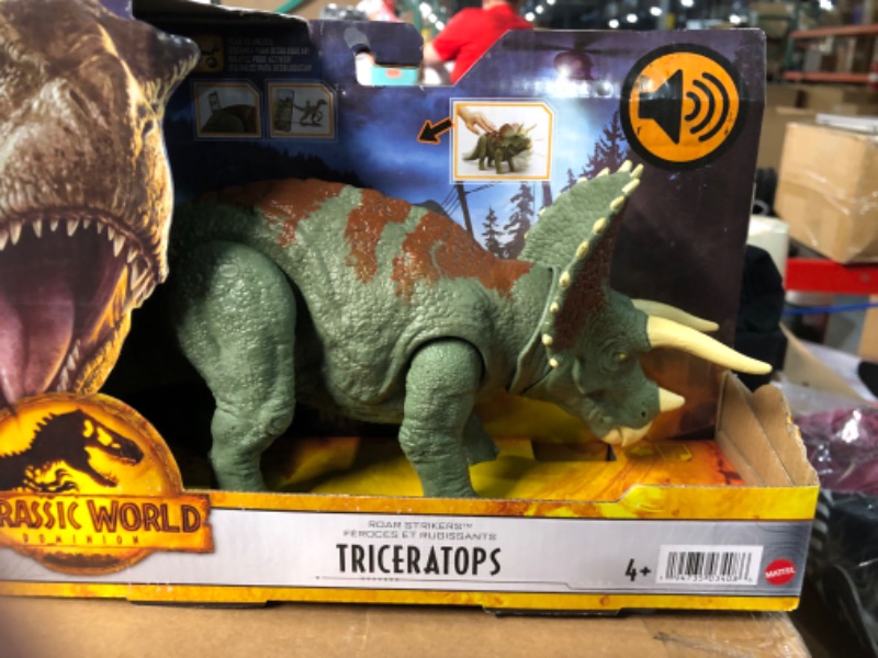 Photo 2 of Jurassic World Dominion Roar Strikers Triceratops Dinosaur Action Figure with Roaring Sound and Attack Action, 