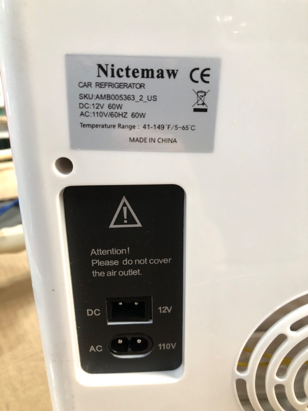 Photo 4 of **HINGE SLIGHTLY OFF**
Nictemaw Mini Fridge Electric Cooler and Warmer, Mini Fridge with LCD Display and Digital Thermostat