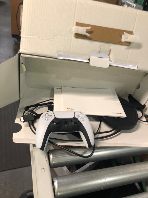 Photo 2 of **tested* ps5 console and controller 