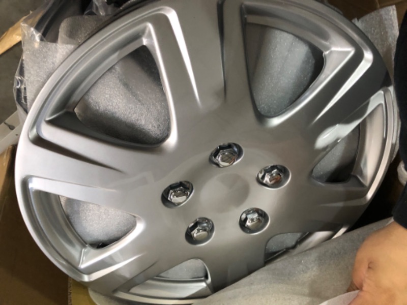 Photo 2 of Four ABS Plastic Silver Colored Hubcaps - 15 Inch Diameter