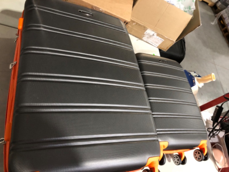 Photo 4 of **USED**CORNERS ARE DENTED IN ON 28 IN**SEE PICTURES **Rockland Melbourne Hard side Expandable Spinner Wheel Luggage, (Charcoal N Orange), 2-Piece Set (20/28)