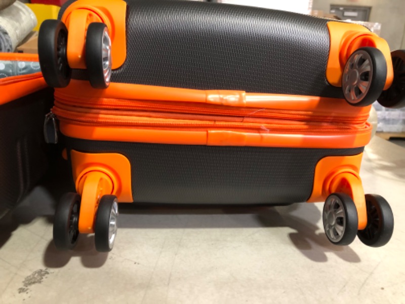 Photo 3 of **USED**CORNERS ARE DENTED IN ON 28 IN**SEE PICTURES **Rockland Melbourne Hard side Expandable Spinner Wheel Luggage, (Charcoal N Orange), 2-Piece Set (20/28)