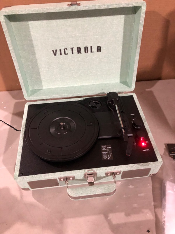 Photo 2 of Victrola Vintage 3-Speed Bluetooth Portable Suitcase Record Player with Built-in Speakers | Upgraded Turntable Audio Sound| Includes Extra Stylus | Light Mint Green Linen