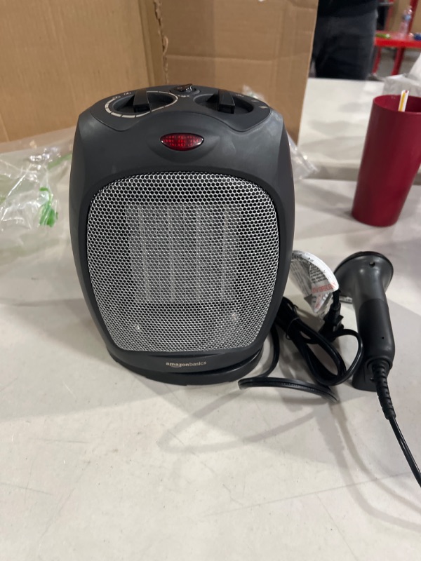 Photo 2 of 4.4 out of 5 stars28,118 Reviews
Amazon Basics 1500W Ceramic Personal Heater with Adjustable Thermostat, Black