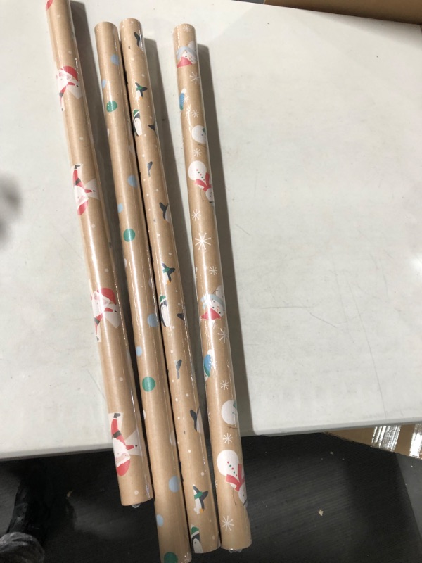 Photo 2 of *NEW* Hallmark Kraft Christmas Wrapping Paper  (4 Rolls: 88 sq. ft. Penguins, Santa, Snowmen, Polka Dots