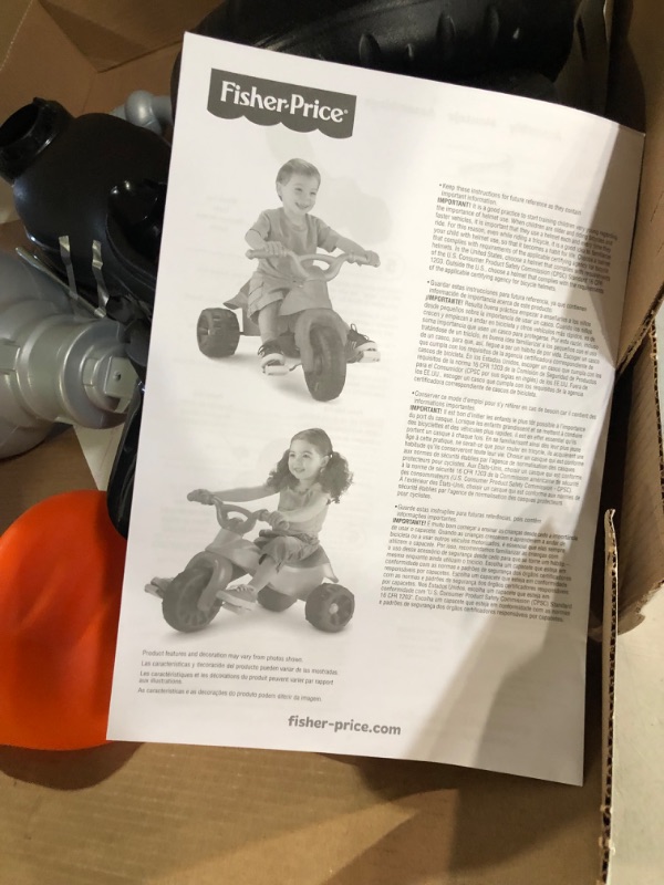 Photo 3 of Fisher-Price Harley-Davidson Tricycle with Handlebar Grips and Storage Area, Multi-Terrain Tires, Tough Trike [Amazon Exclusive]