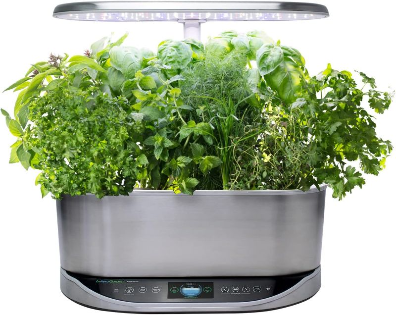 Photo 1 of ***SEE NOTES*** AeroGarden Bounty Elite - Indoor Garden with LED Grow Light, WiFi and Alexa Compatible, Stainless Steel