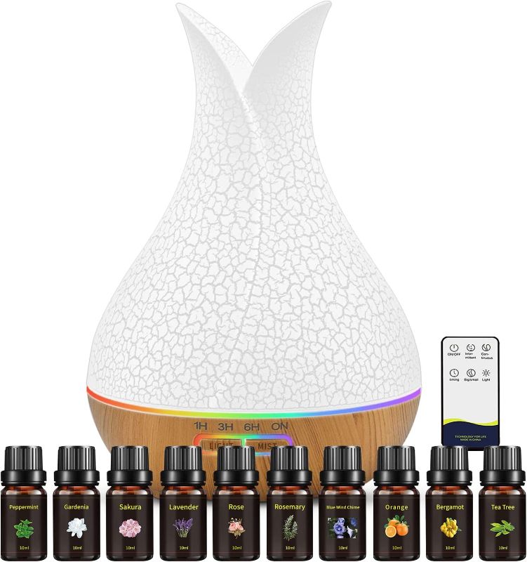 Photo 1 of **USED/SEE NOTES** 500ML Essential Oil Diffuser W/ 10 Essential Oils 