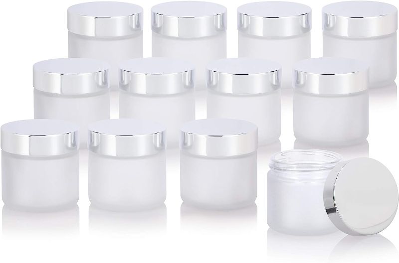 Photo 1 of 2 oz / 60 ml Frosted Clear Thick Glass Straight Sided Jar with Silver Metal Overshell Lid (12 pack)