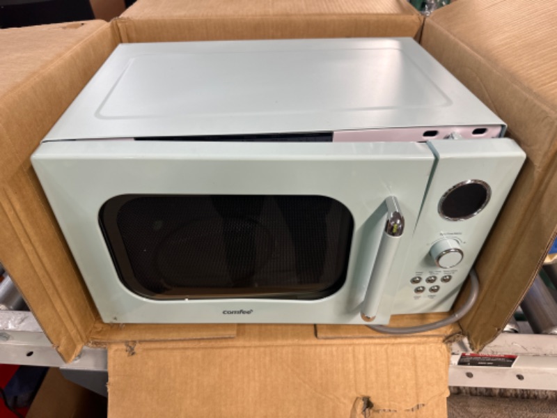 Photo 2 of ***DAMAGED, SEE NOTES*** Nostalgia Retro Compact Countertop Microwave Oven, 0.7 Cu. Ft. 700-Watts with LED Digital Display, Child Lock, Aqua