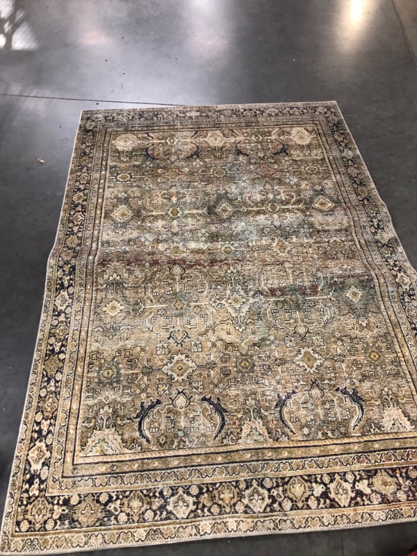 Photo 3 of **item appears to be used**item is green**signs of discoloring** 
Loloi II LAYLLAY-03OLCC5076 Layla Collection Area Rug, 5'0" x 7'6", Olive/Charcoal