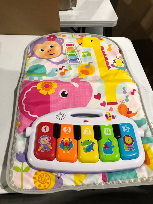 Photo 2 of Fisher-Price Baby Gym with Kick & Play Piano Learning Toy featuring Smart Stages Educational Content and 2 Soft Maracas Rattle Toys Kick 'n Play Gym & Maracas