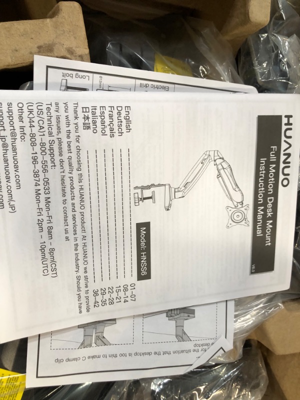 Photo 2 of HUANUO Single Monitor Mount, Articulating Gas Spring Monitor Arm, Adjustable Monitor Stand, Vesa Mount with Clamp and 