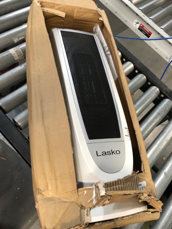 Photo 1 of Lasko Oscillating Digital Ceramic Tower Heater for Home with Overheat Protection, Timer and Remote Control, 22.75 Inches, 1500W, White