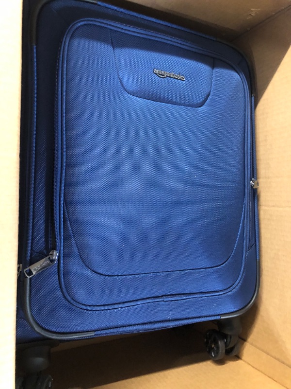 Photo 2 of Amazon Basics Expandable Softside Carry-On Spinner Luggage Suitcase With TSA Lock And Wheels - 23 Inch, Blue Blue 23-inch Suitcase