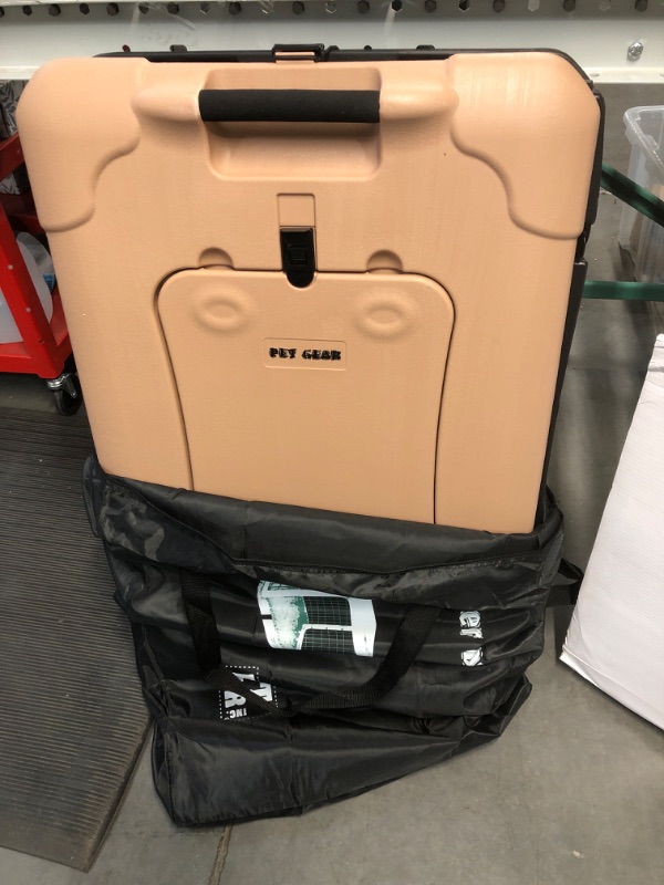 Photo 3 of **DOOR HAS A BEND**
Pet Gear “The Other Door” 4 Door Steel Crate for Dogs/Cats with Garage-Style Door, Includes Travel Bag, 36 Inch Tan 2022