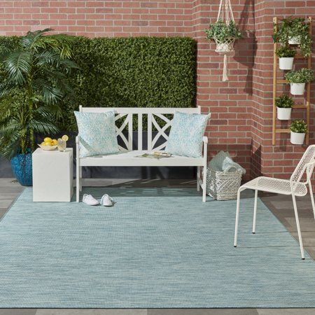 Photo 1 of **USED-NEEDS CLEANING**
 Positano Natural Indoor Outdoor Rug, Blue, 6X9 Ft
