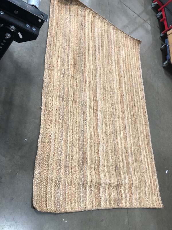 Photo 6 of **USED-NEEDS CLEANING**
60'INCH X 93'INCH WOVEN RUG 