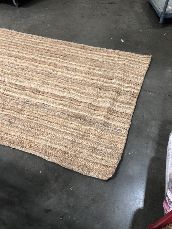 Photo 4 of **USED-NEEDS CLEANING**
60'INCH X 93'INCH WOVEN RUG 