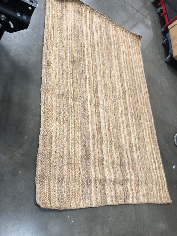 Photo 5 of **USED-NEEDS CLEANING**
60'INCH X 93'INCH WOVEN RUG 