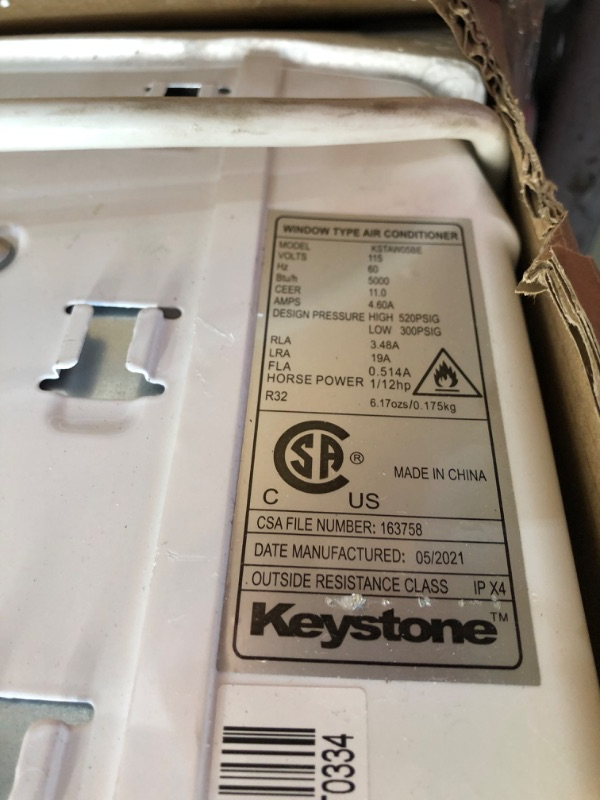 Photo 1 of 5,000 BTU Window-Mounted Air Conditioner with Follow Me LCD Remote Control - Keystone KSTAW05BE
