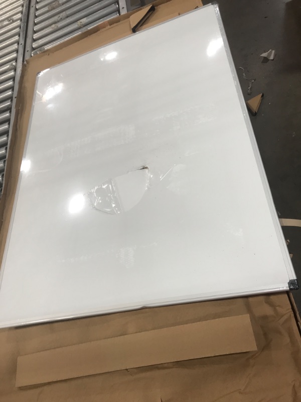 Photo 3 of **DAMAGED** Amazon Basics Magnetic Dry Erase White Board, 35 x 47-Inch Whiteboard - Silver Aluminum Frame
