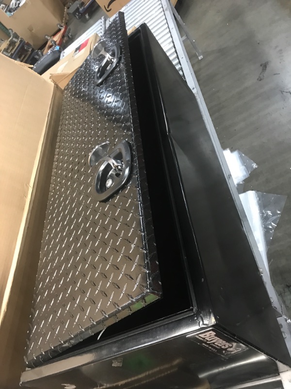 Photo 1 of **DAMAGED** Buyers Products 1702510 Black Steel Underbody Truck Box with Aluminum Door, 18 x 18 x 48 Inch
