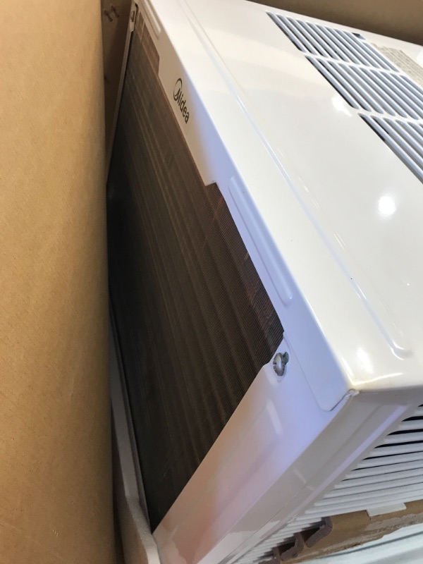 Photo 6 of **Minor Damage* MIDEA MAW05M1BWT - 5000 BTU Window Air Conditioner with Mechanical Controls, 7 Temperature Settings, 2 Cool Settings and Fan