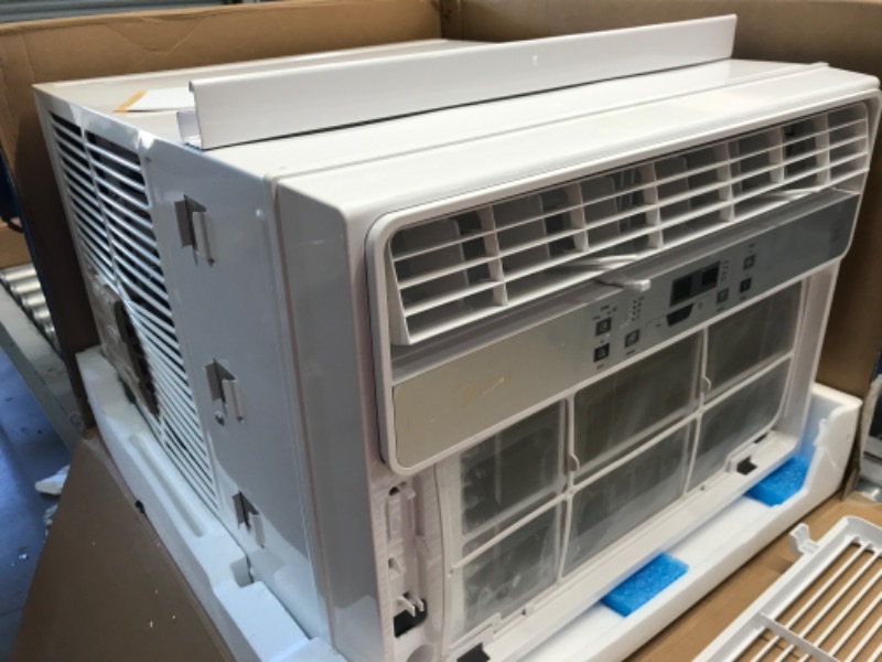 Photo 4 of **Minor Damage* MIDEA MAW05M1BWT - 5000 BTU Window Air Conditioner with Mechanical Controls, 7 Temperature Settings, 2 Cool Settings and Fan