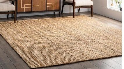 Photo 1 of **damaged-needs cleaning**
Rigo Chunky Loop Jute Tan 6 ft. x 9 ft. Area Rug
