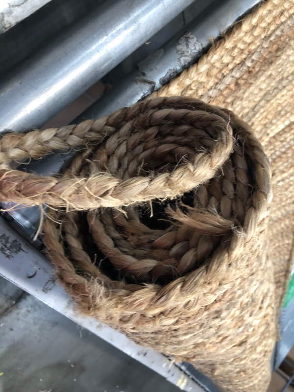 Photo 1 of **damaged-needs cleaning**
Rigo Chunky Loop Jute Tan 6 ft. x 9 ft. Area Rug
