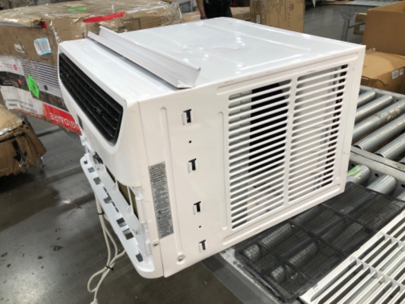 Photo 2 of **DAMAGED BUT FUNCTIONS** Keystone 12,000 BTU 230V Through-The-Wall Air Conditioner | Energy Star | Follow Me LCD Remote Control | Dehumidifier | Sleep Mode | 24H Timer | AC for Rooms up to 550 Sq. Ft. | KSTAT12-2C
